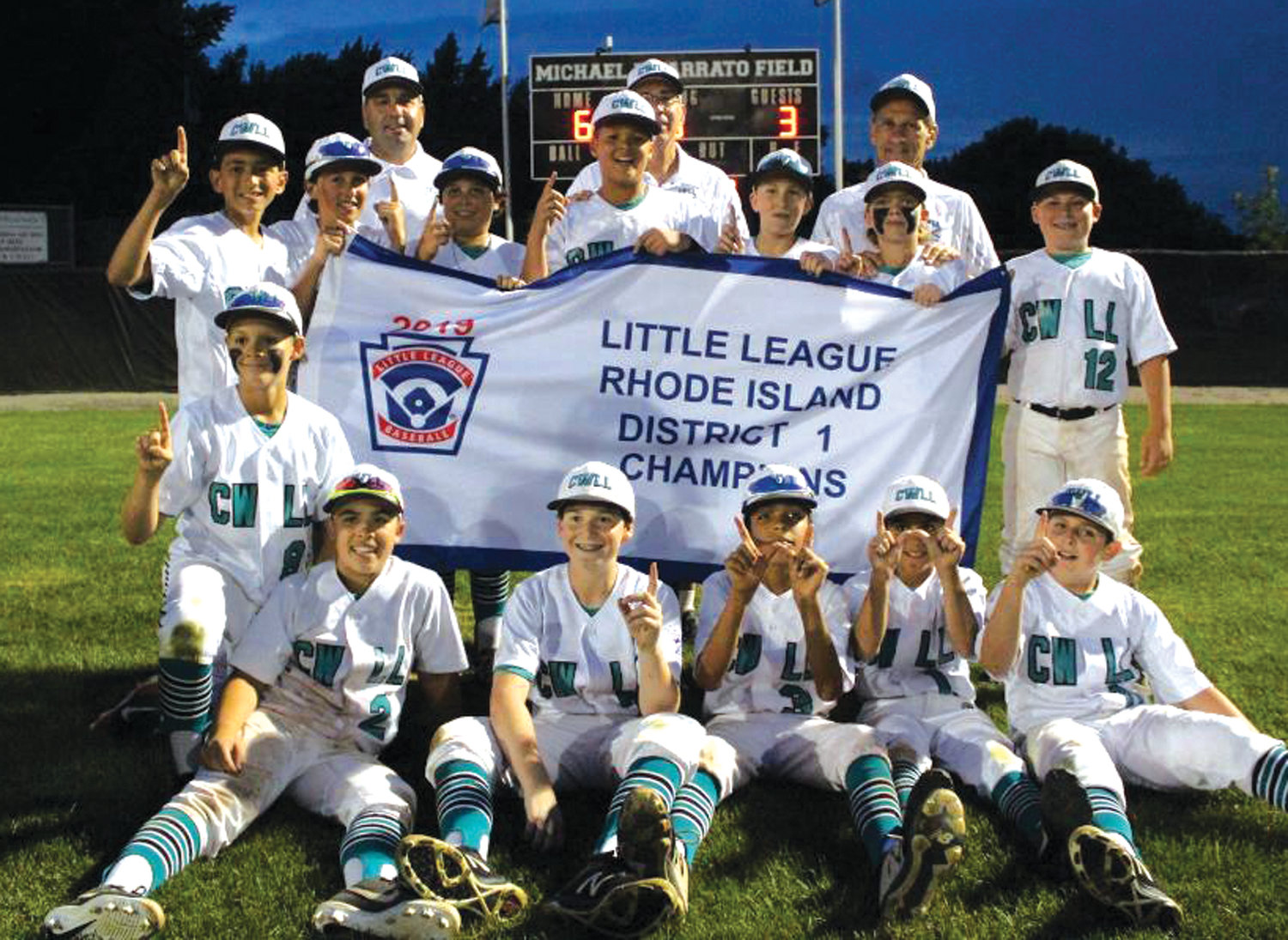 WE ARE THE CHAMPIONS: The Cranston Western 12’s after winning the District I title.