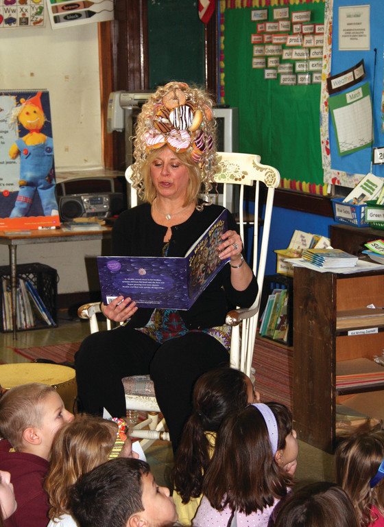 HER HAIR IS MADE OF DONUTS: When Joy Feldman visits schools to read, she wears a specially created donut wig to illustrate her point: you really are what you eat.