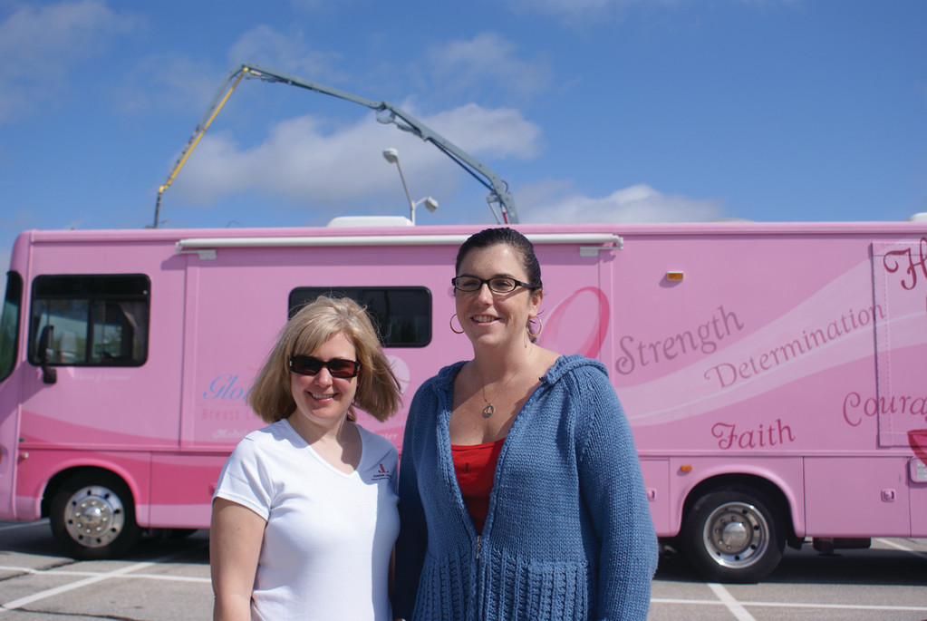 BRINGING HOPE: Alison Croke and Tracy Baran, co-chairs of the Touch A Truck event, check out the Gloria Gemma Breast Cancer Resource Foundation’s Hope Bus.