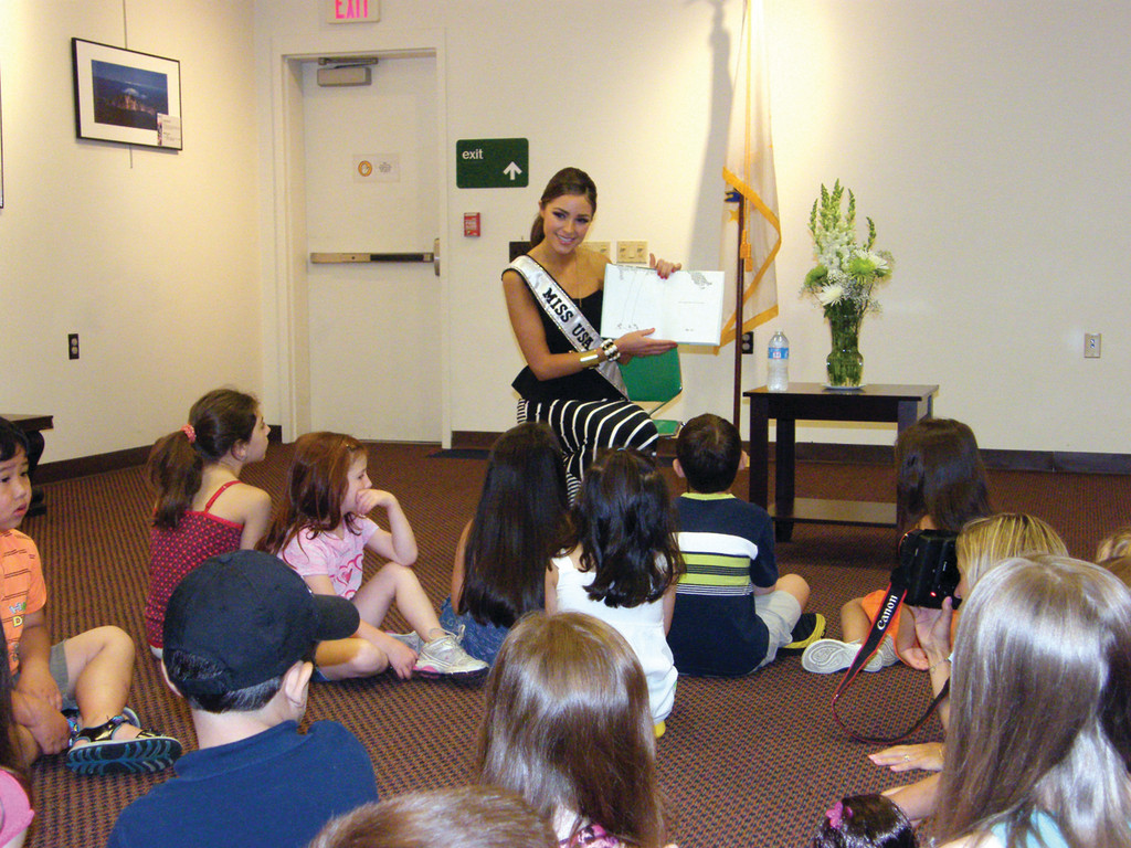 STORY TIME: Culpo read to a group of 4- and 5-year-olds during her time in Cranston on Friday.