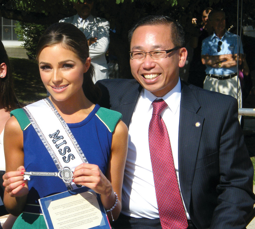 KEY TO THE CITY: Olivia Culpo shows off the handcrafted, pewter key to the city that Mayor Allan Fung presented to her.