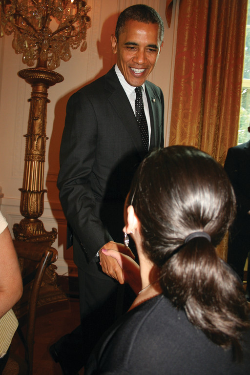 PLEASE, CALL ME CAROLINE: President Barack Obama shakes hands with Caroline Cowart at the White House State Dinner for the winners of the Healthy Lunch contest on Aug. 20.