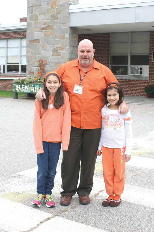 PURE PRIDE: Jay DeCristofaro, principal at Glen Hills Elementary School, is pictured along with Alexandra and Elizabeth Cowart; two students at his school who encouraged him, the staff and fellow students to get on board with