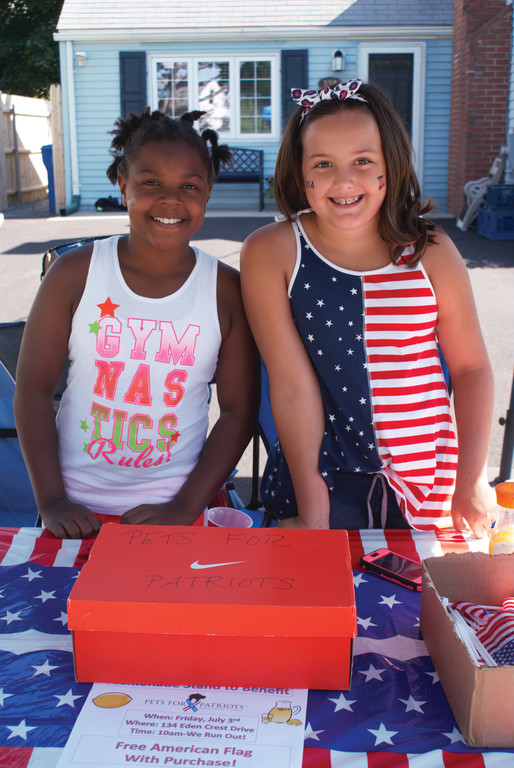 FRIENDS WITH A CAUSE: Oliva VanPatten, 9, and her friend Amani Jackson, 10, ran a successful lemonade stand to benefit Pets for Patriots.