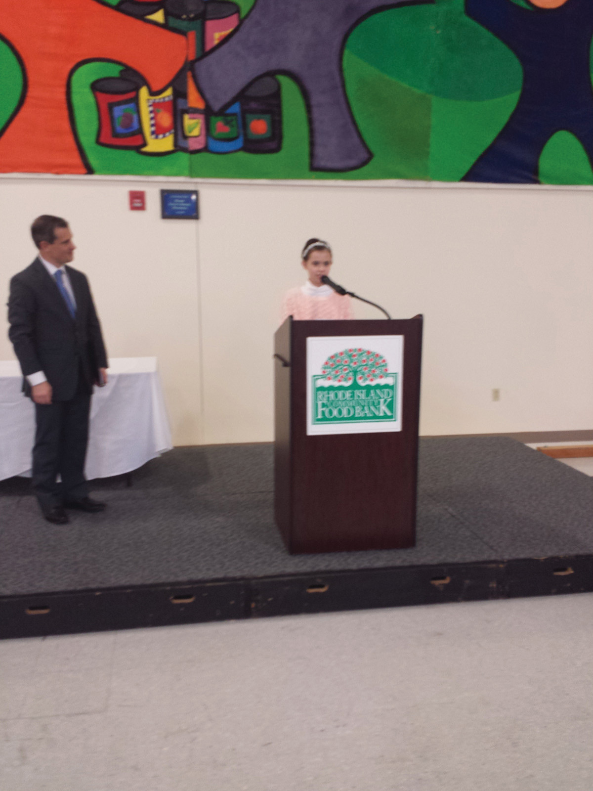 A HEALTHY DESSERT: Cranston’s Lily Addonizio, a fifth-grader from Immaculate Conception Catholic Regional School, addressed the group just before dessert. She talked a bit about herself, and about her winning dessert recipe for apple roses.