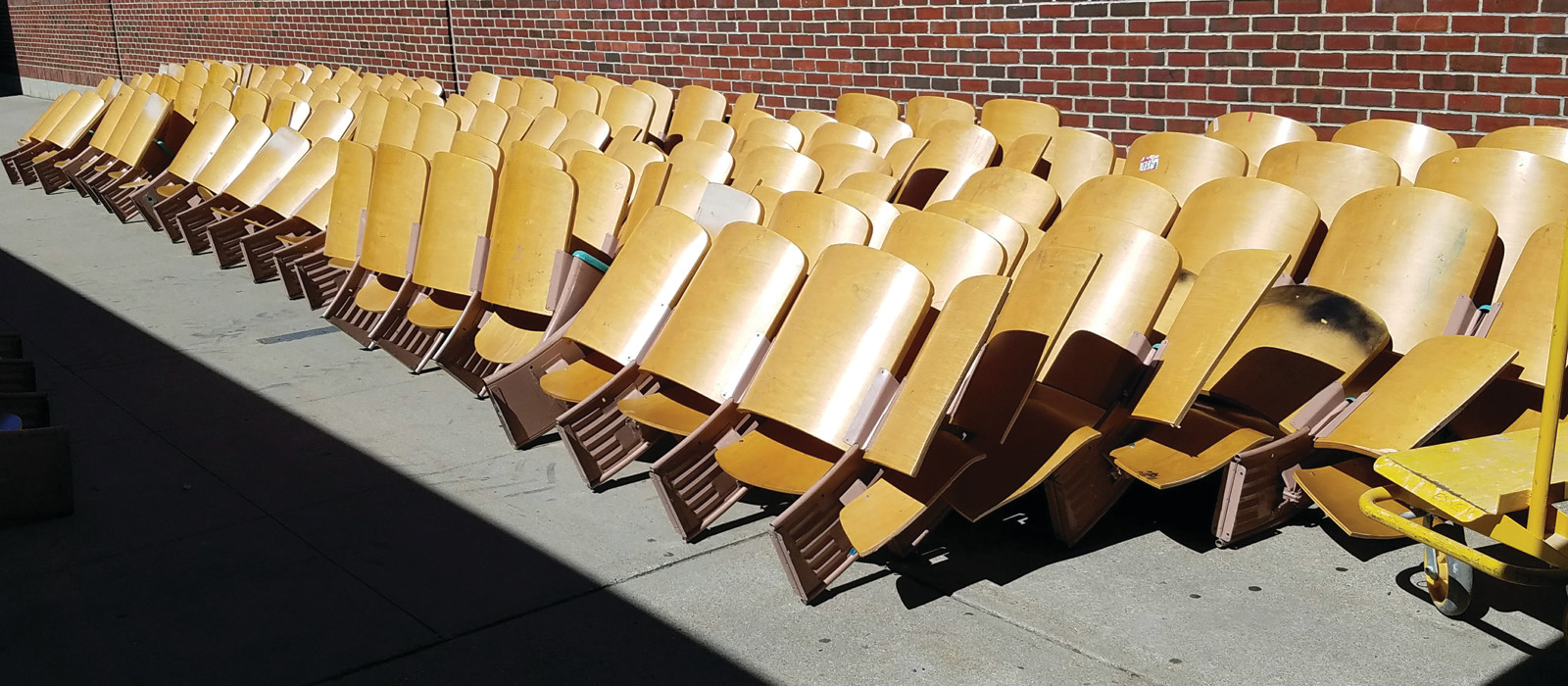 IF THESE SEATS COULD TALK: The auditorium seats lined the Cranston West walkways, waiting to be taken away. These same seats have seen 54 years of students sitting in them for school-wide events and community happenings, with generations of people utilizing the space for nearly 60 years.