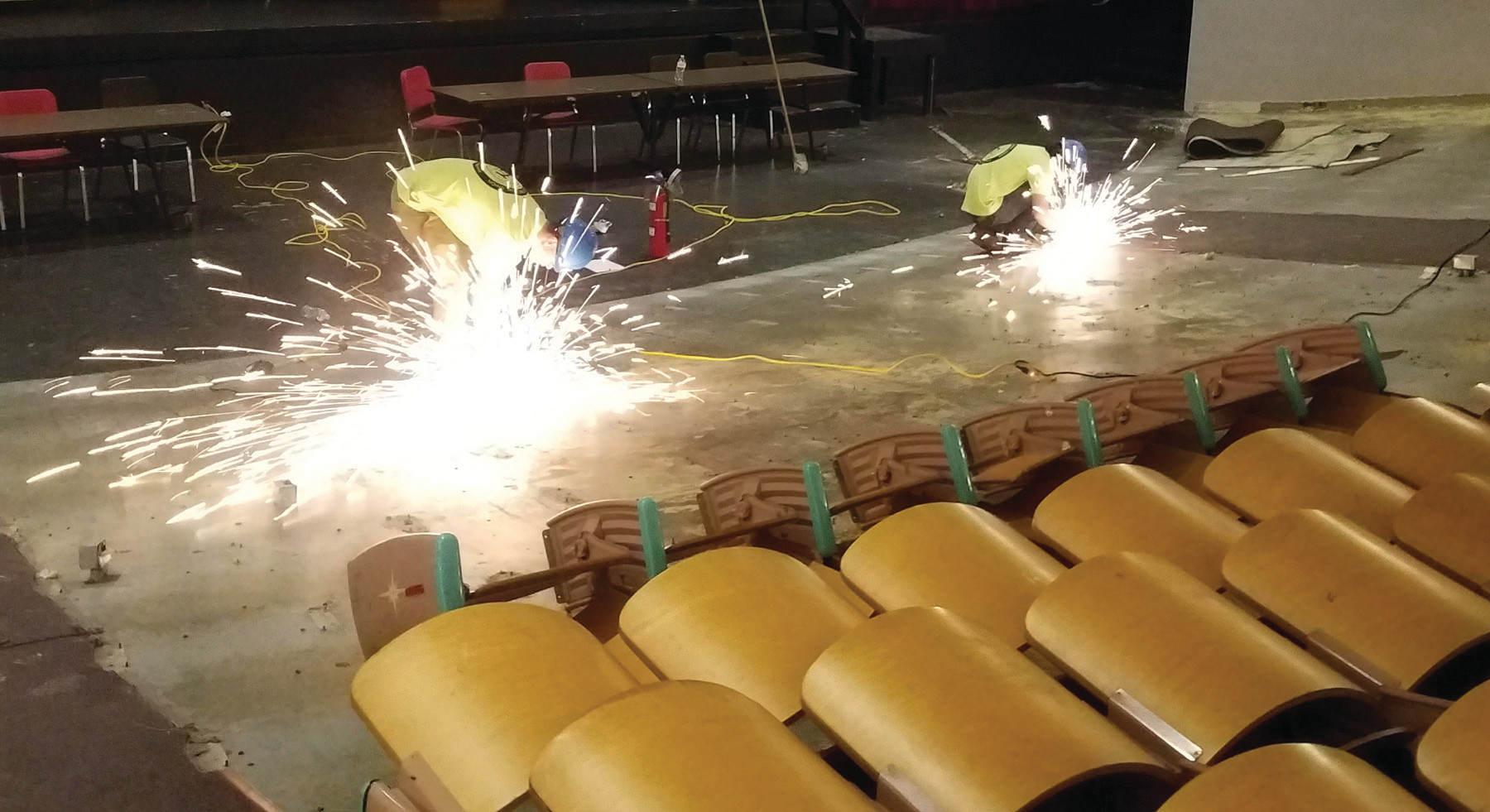 OUT OF THE CLASSROOM AND ON THE JOB: Sparks were flying on June 22 at Cranston West as the newest graduates from the New England Laborers’/Cranston Public Schools Construction Career Academy put their education to the test, using the skills they learned in school on their first official job site.