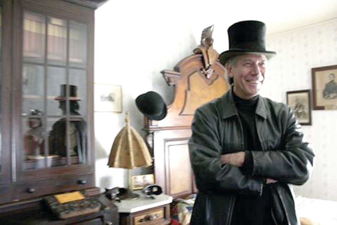 MADNESS IN THE MIRROR: In 2005, Kennedy and Bell met for an interview at Sprague Mansion. Kennedy asked Bell to put on a top hat that was on the bed for a profile photograph. Yet, a woman appeared in the mirror dressed in clothing of the 1880s, on film. Bell is a folklorist and author, and retired folklorist for the State of Rhode Island. Kennedy has been a reporter with the Cranston Herald for more than two decades.