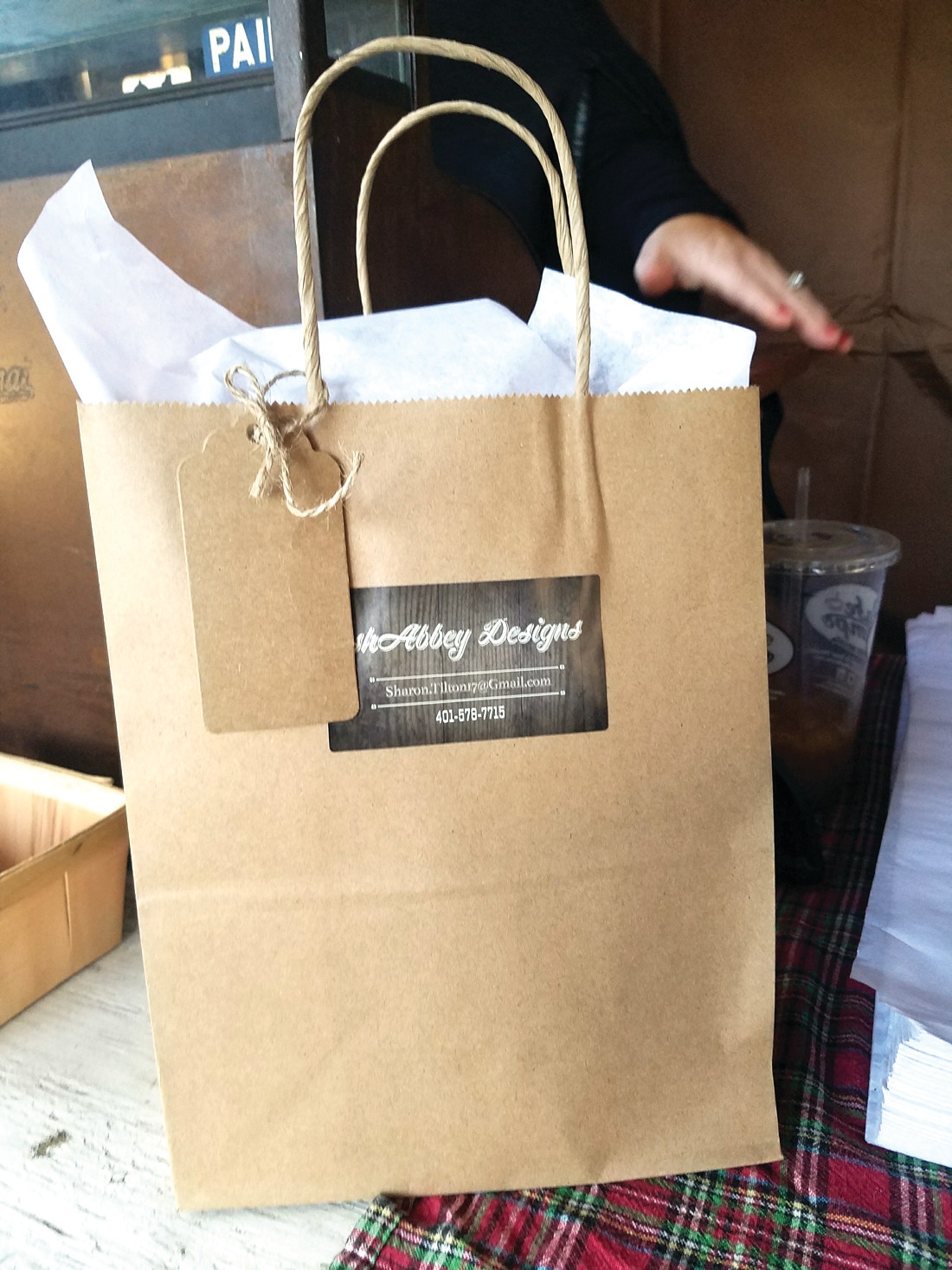 THAT SPECIAL TOUCH: Each item went home with Abbey’s Shabbey Designs signature wrapping and gift bags and a thank-you tag.