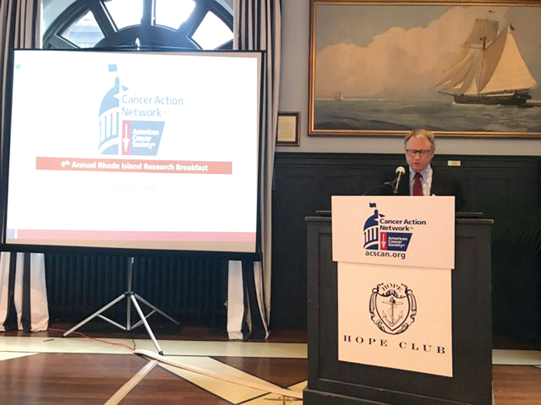 TURNING DIAGNOSIS INTO ADVOCACY: Ted Simon speaks at a recent ASCAN breakfast in Providence about his advocacy for cancer research funding.
