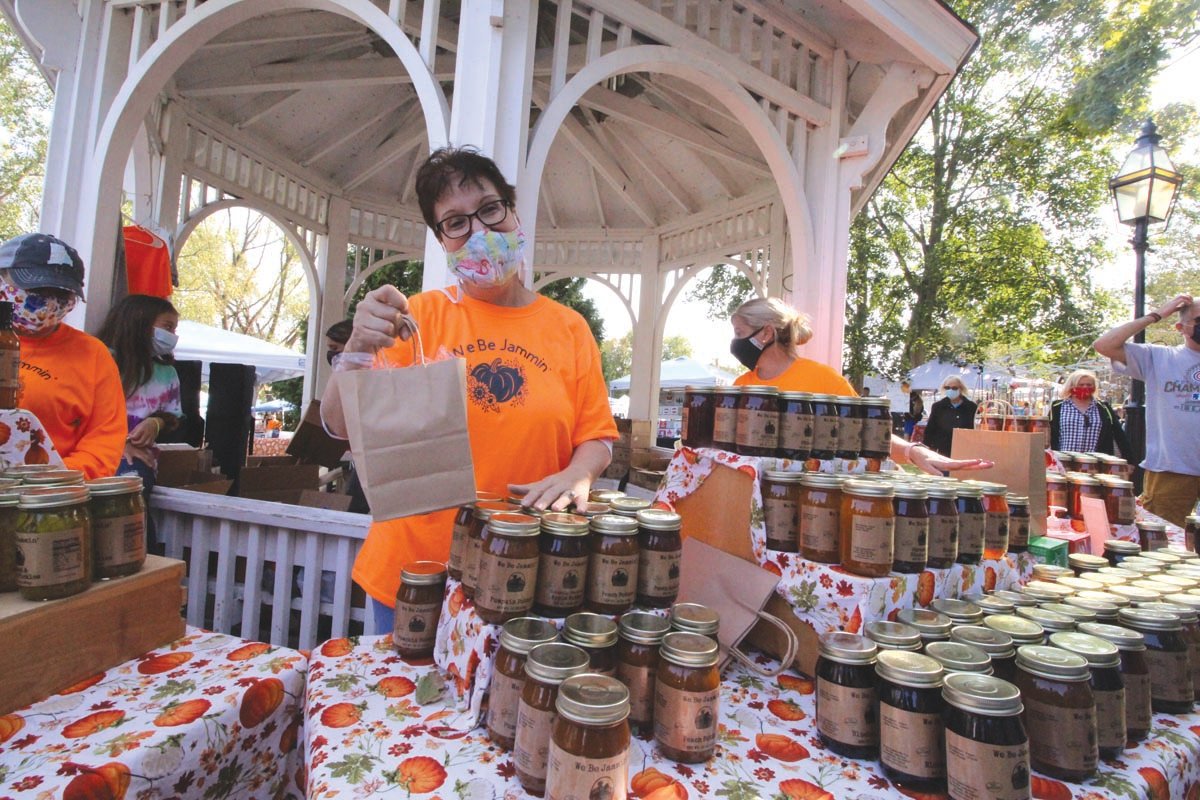 REALLY JAMMIN’: Deb Wood, who rallied vendors for the Outside Marketplace that will be held every Saturday through Dec. 12 at Pawtuxet Village Park, worked her own table as well as overseeing the first marketplace Saturday.