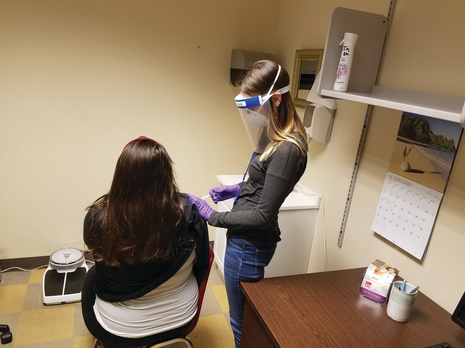 ACT Team RN Jenna O’Brien administers Haldol decanoate to a client.