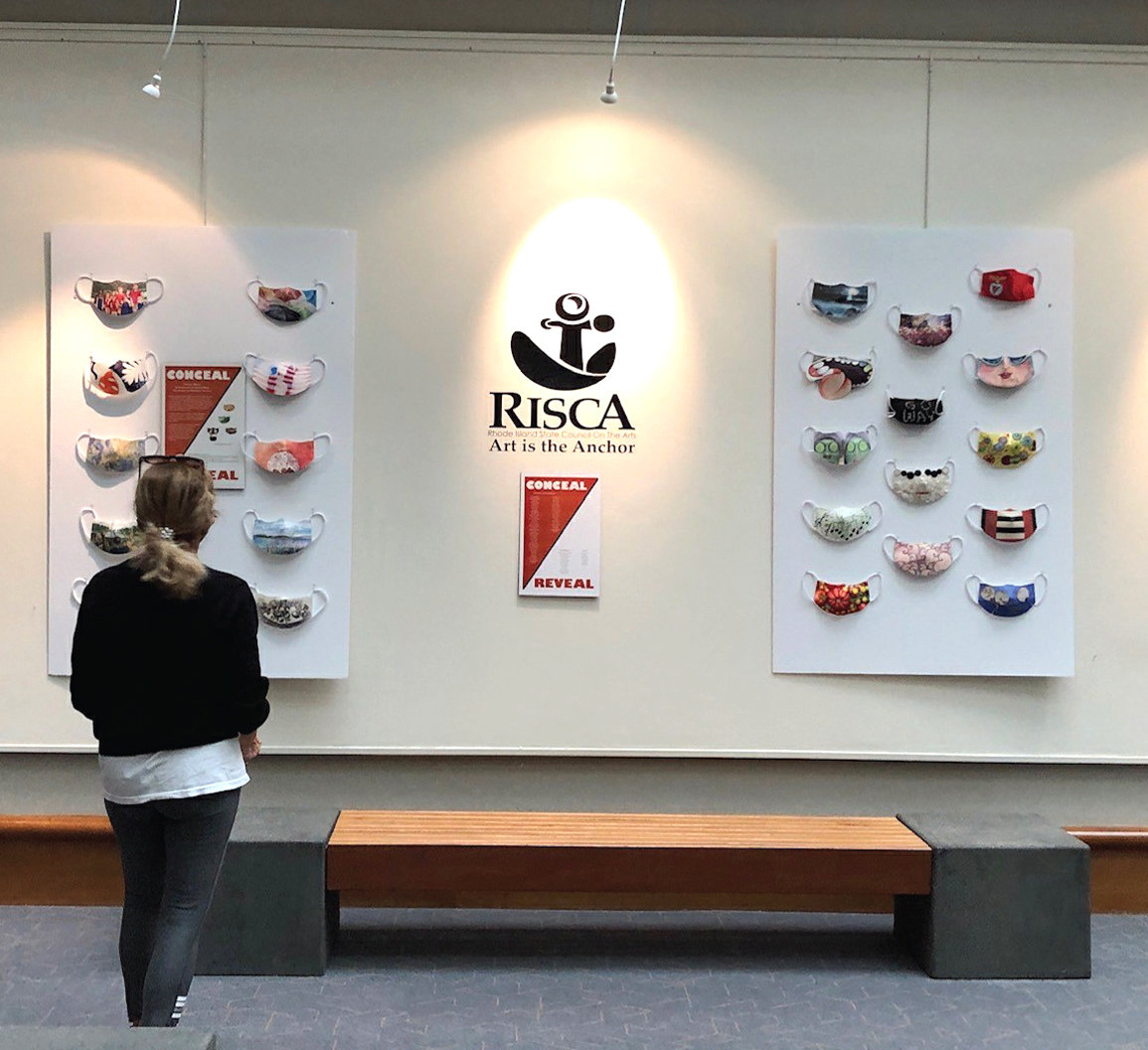 CONCEAL/REVEAL: Now on display in the Atrium Gallery on the main floor of the state’s Administration Building is the Conceal/Reveal Mask Installation. Created during the pandemic, the handmade face masks examine the intersection of the arts and health.