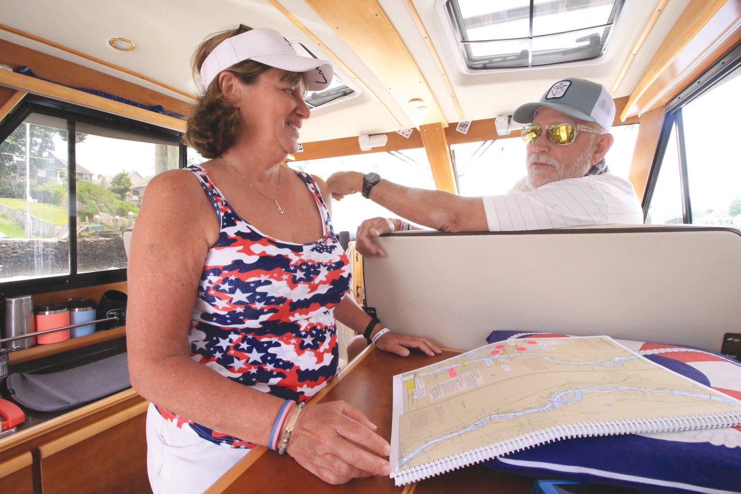 CLOSE QUARTERS: Every square inch of the boat has a purpose. There’s even a place for Marie’s spreadsheets and charts that have been carefully highlighted with stickers to remind the two of them places and people they want to see on their trip.