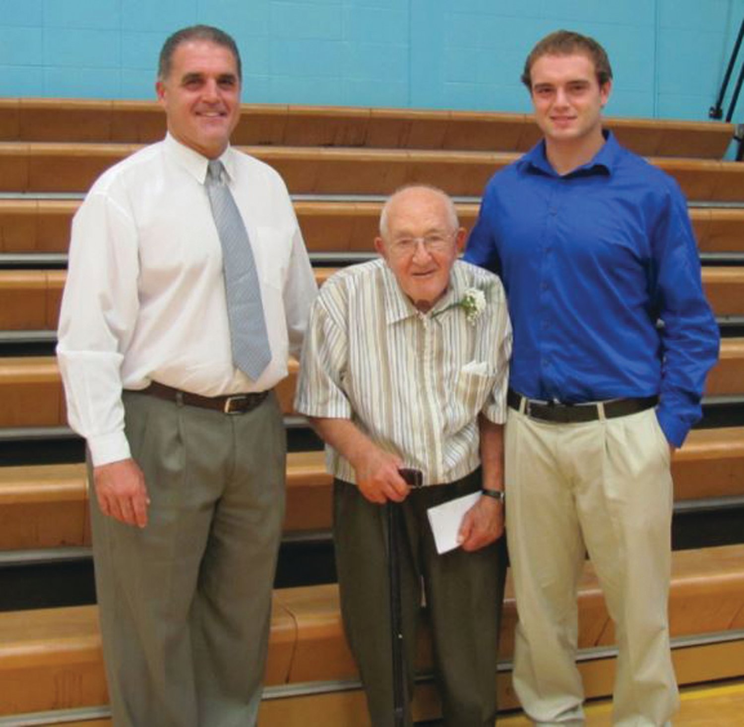 FAMILY BUSINESS: Tom Centore (left) joins his father Tony (center) after he was inducted into the Johnston High School Athletic Hall of Fame back in 2012. Alongside is Tom’s son Jason
(right), who would go on to coach under his father for Cranston East.