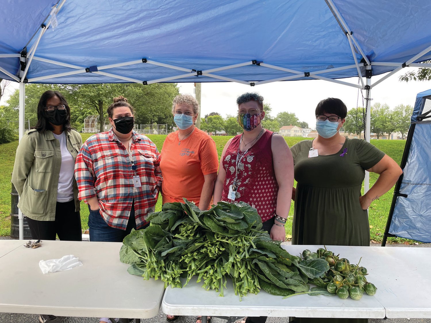 FRIENDS OF FARMERS: Pictured from OneCranston HEZ during a recent farmers market at the Bain track are, from left, Victoria Madrid, Meg Donnelly, Grace Swinski, Ivy Swniski and Monica Phan. Not pictured is Sarah Cote, the initiative director.