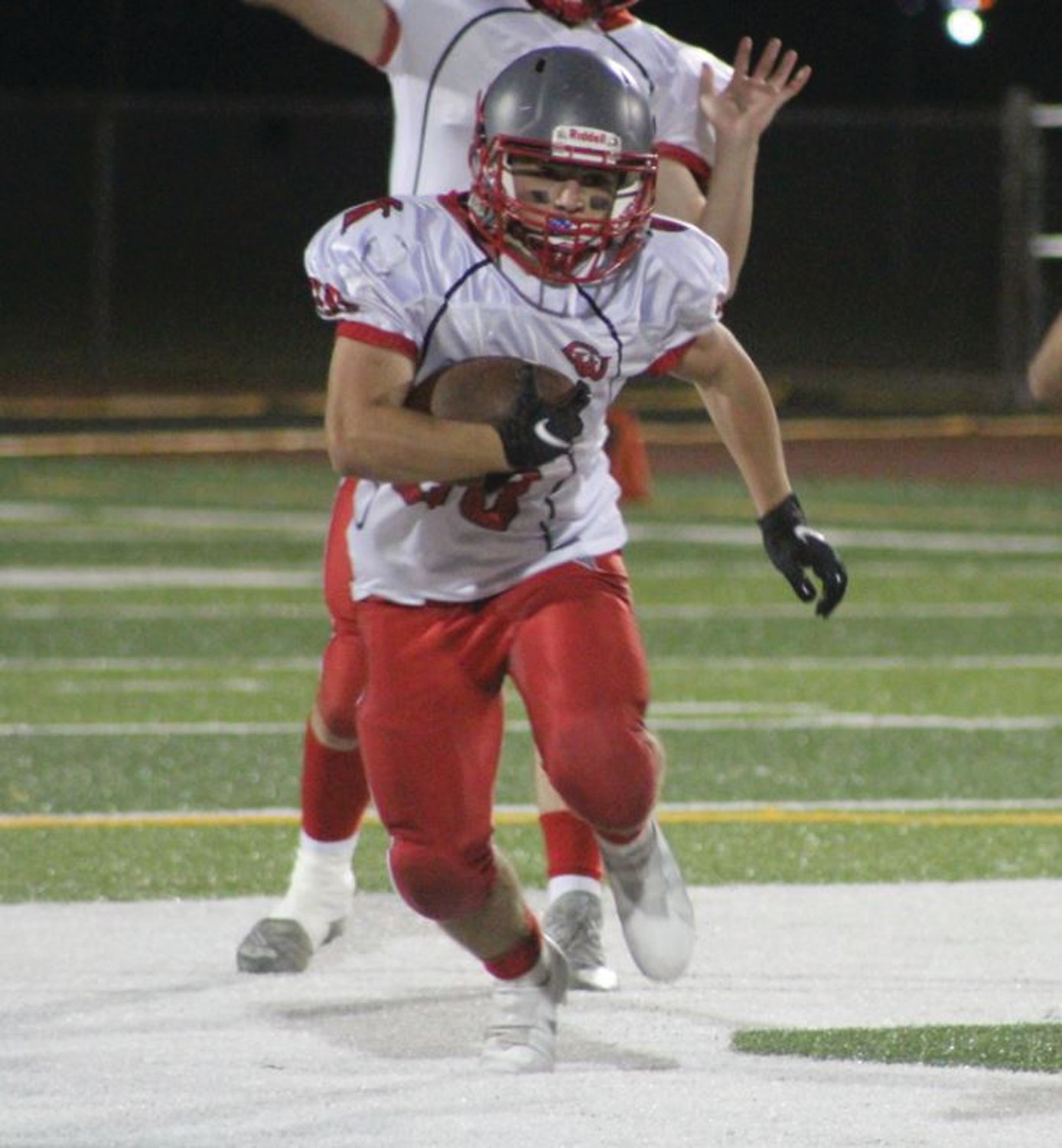 UP THE GUT: West’s Dimitri LeBlanc picks up some yards.