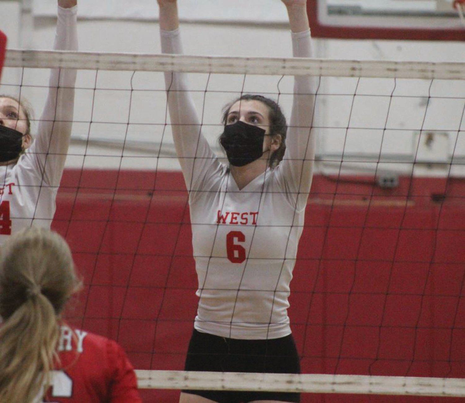 BLOCK: West’s Kaitlyn Antonucci looks to make a block against Coventry.
