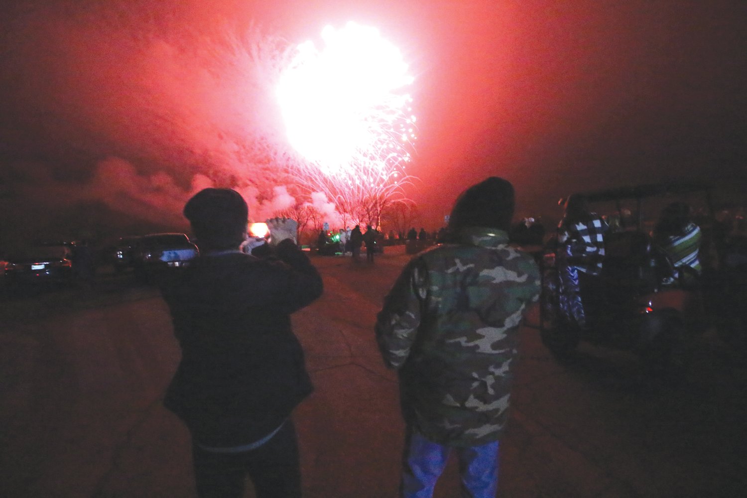 WHAT EVERBODY WAS WAITING FOR: Misty conditions gave a surreal glow to the fireworks display.