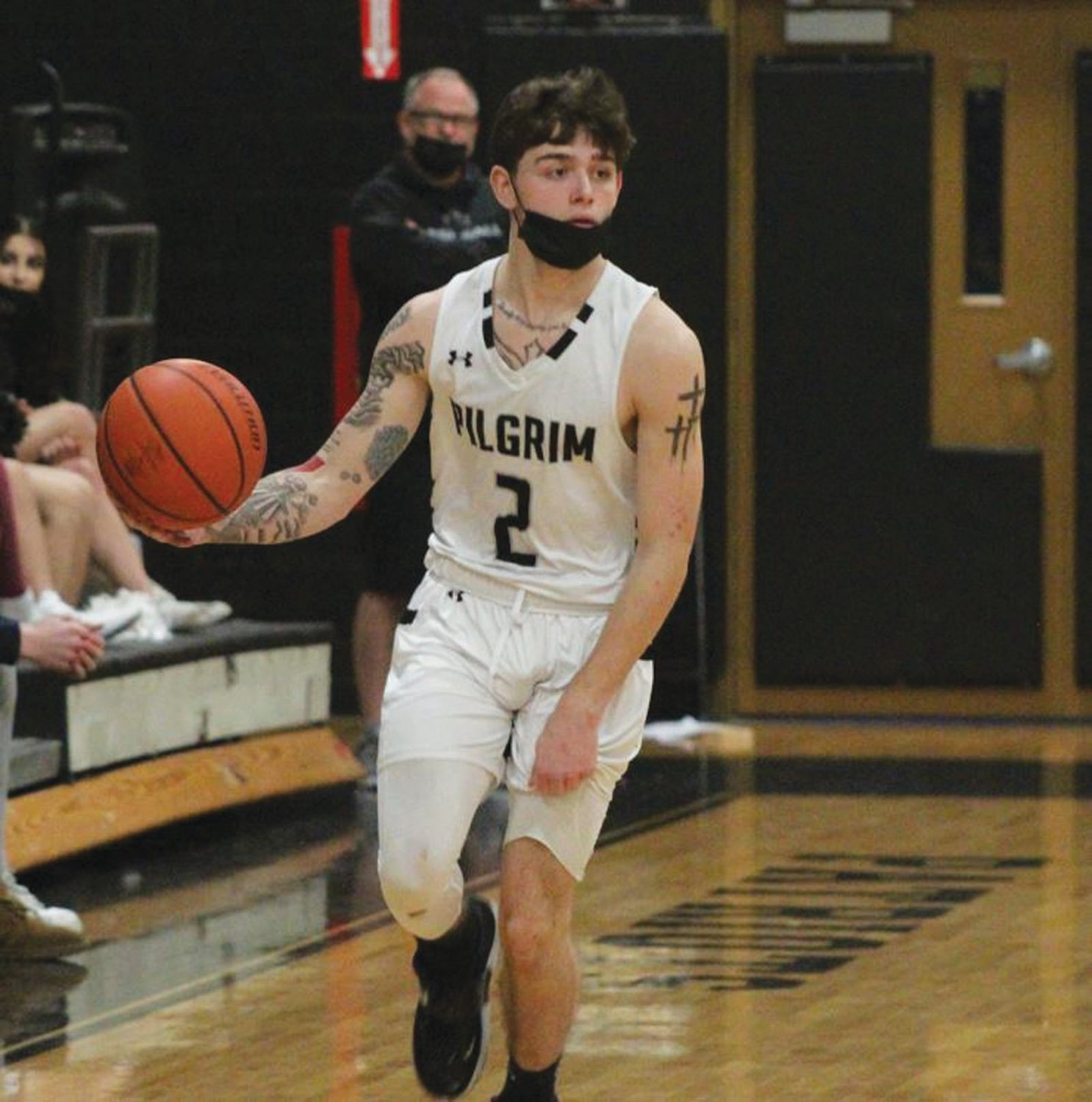AT THE POINT: Pilgrim’s DJ Sollitto takes the ball up the court on Monday.
