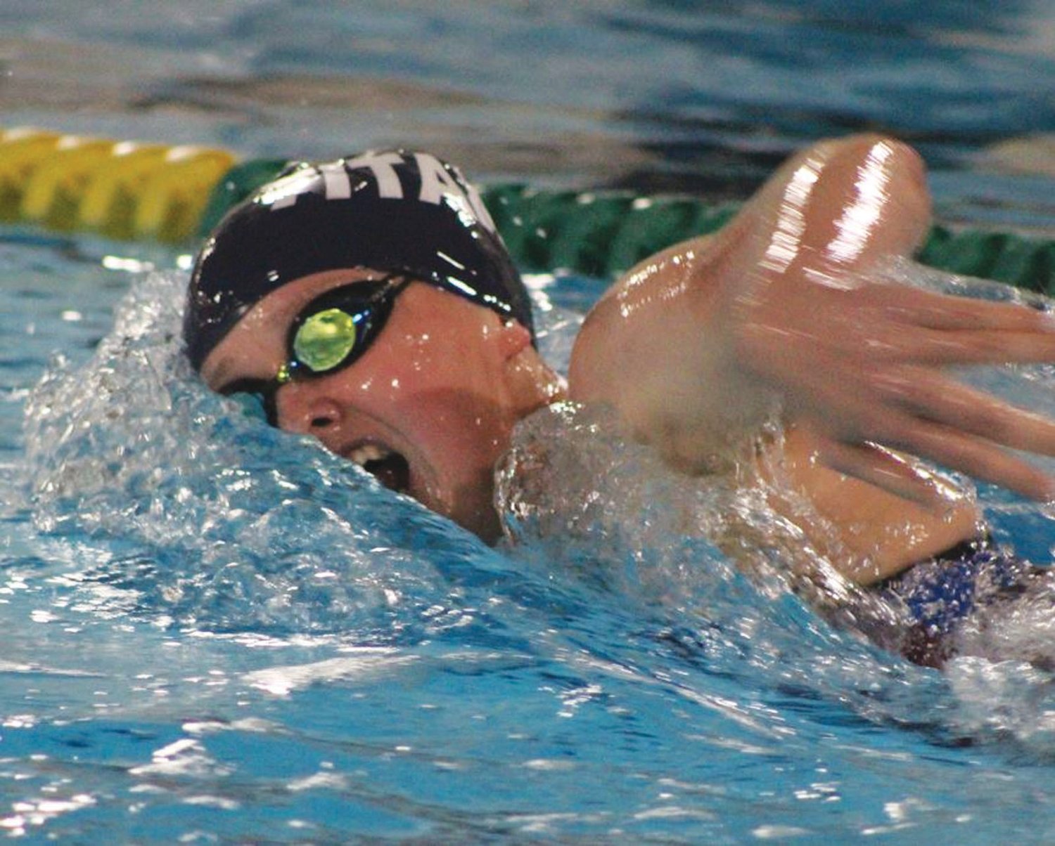 LEADING THE WAY: Toll Gate captain Oce Lowe competes in the 500 freestyle. (Photos by Alex Sponseller)