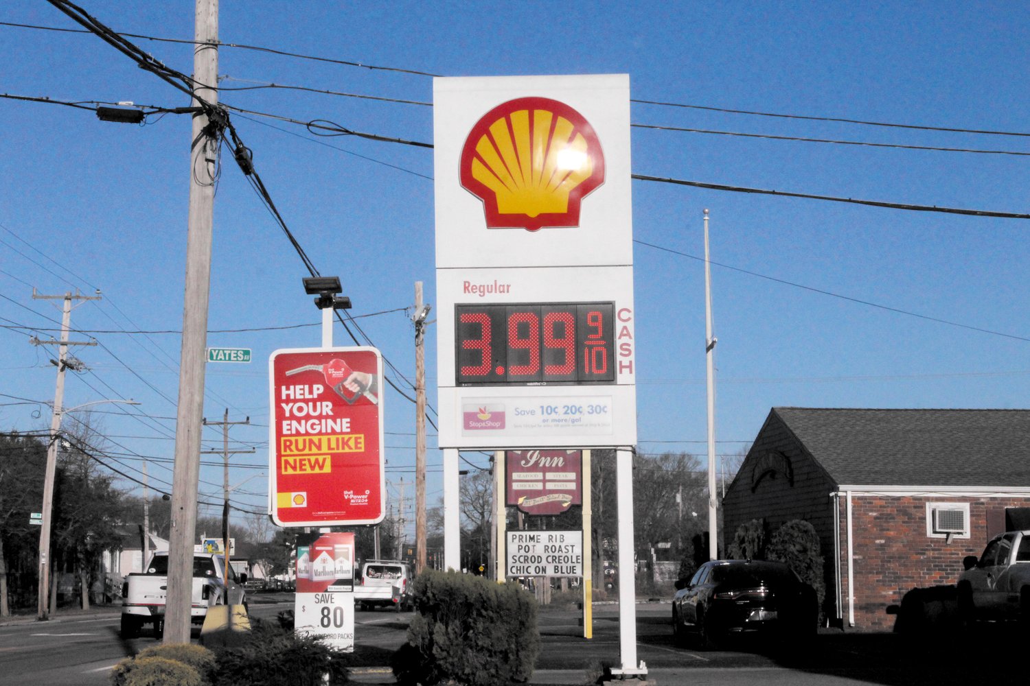 UNDER THE $4 BARRIER: Gasoline prices dipped under $4 a gallon this Tuesday at some stations including this Shell station on West Shore Road in Warwick.