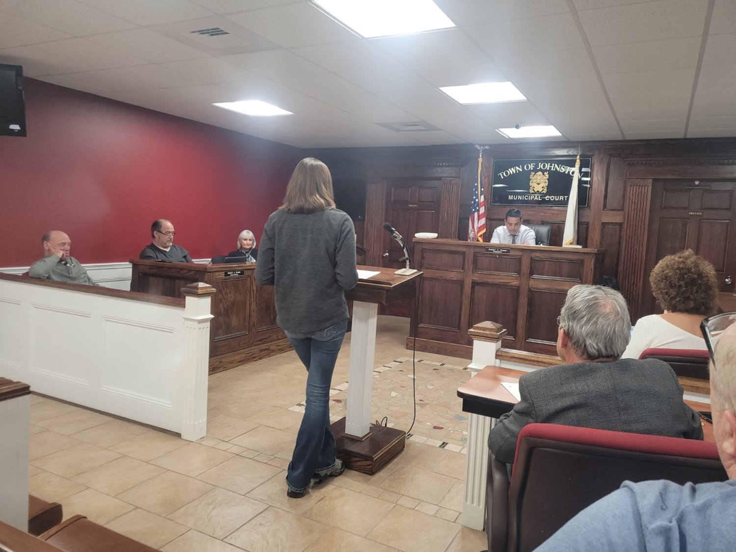 TOWN COUNCIL PLEAS: Bonnie Dibble, shown here, and her husband, Chris Dibble, both addressed Johnston Town Council, asking for a pause in new solar project development in town. A large solar field has been proposed for a plot of woodland abutting their property.