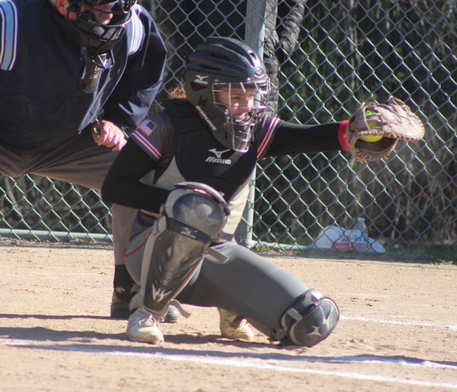 BEHIND THE PLATE: West catcher Emily Eastman.