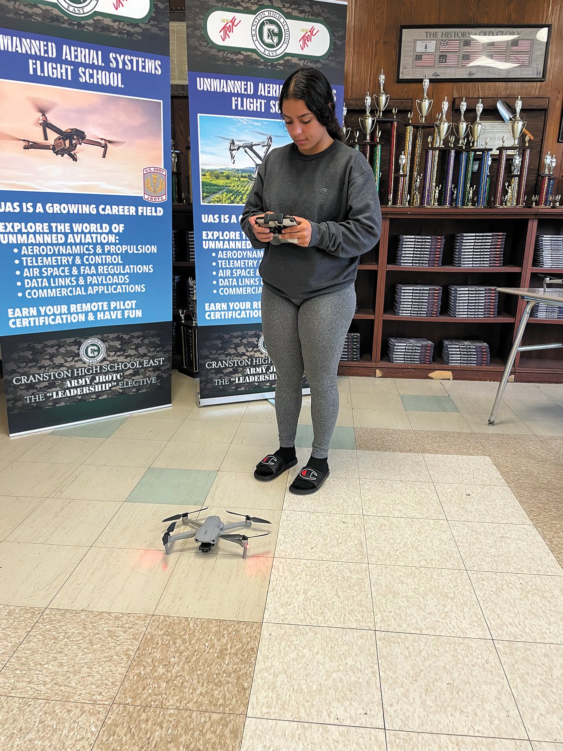 LET ME SHOW YOU WHAT THIS BABY CAN DO: Alexis Franco shows off her drone skills after completing the eight module program in the JROTC class.