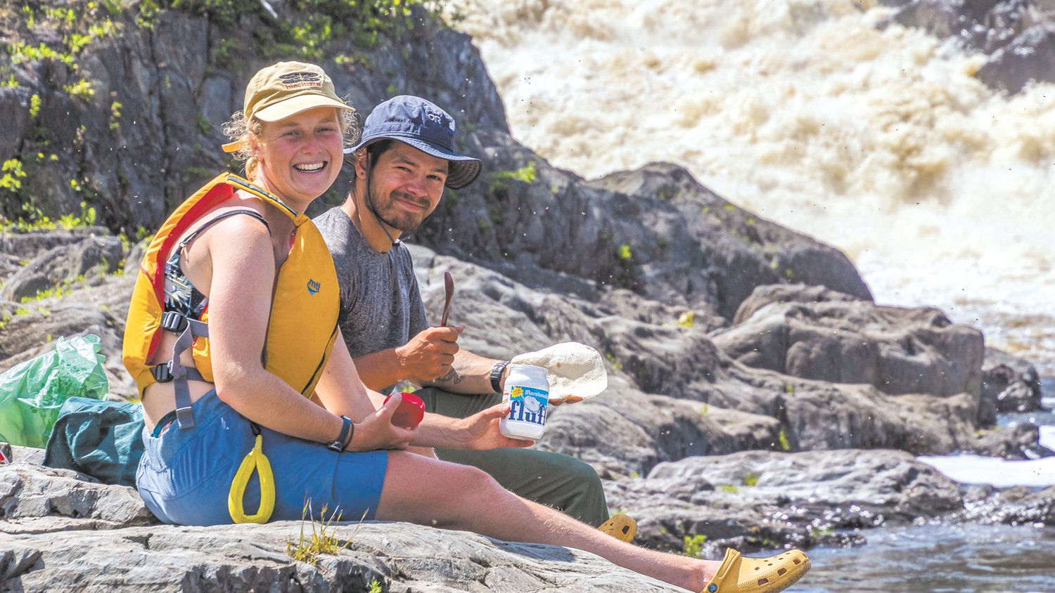 TIME FOR A SNACK: Phoebe and Ben take a break from paddling.