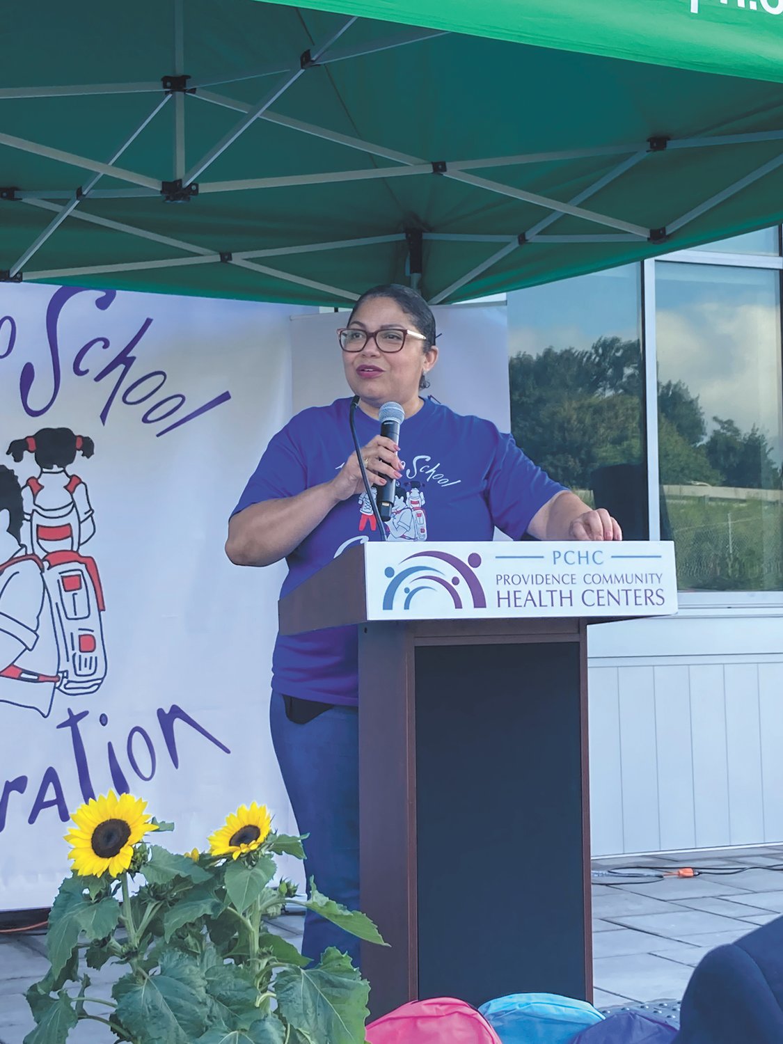 A WORD FROM THE VICE-CHAIR: Board Vice-Chair Doris De Los Santos welcomes individuals to the 23rd annual Back to School Celebration. (Herald photo)