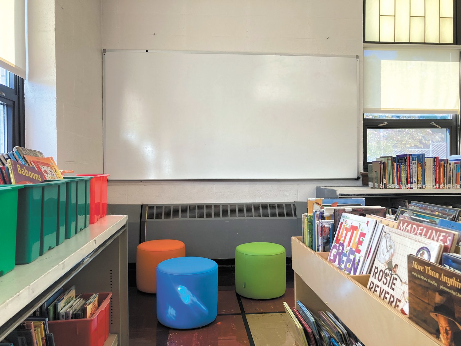 A QUIET, COZY NOOK: In the far corner of the library is a quiet nook where students can read or engage in group work. (Herald photo)