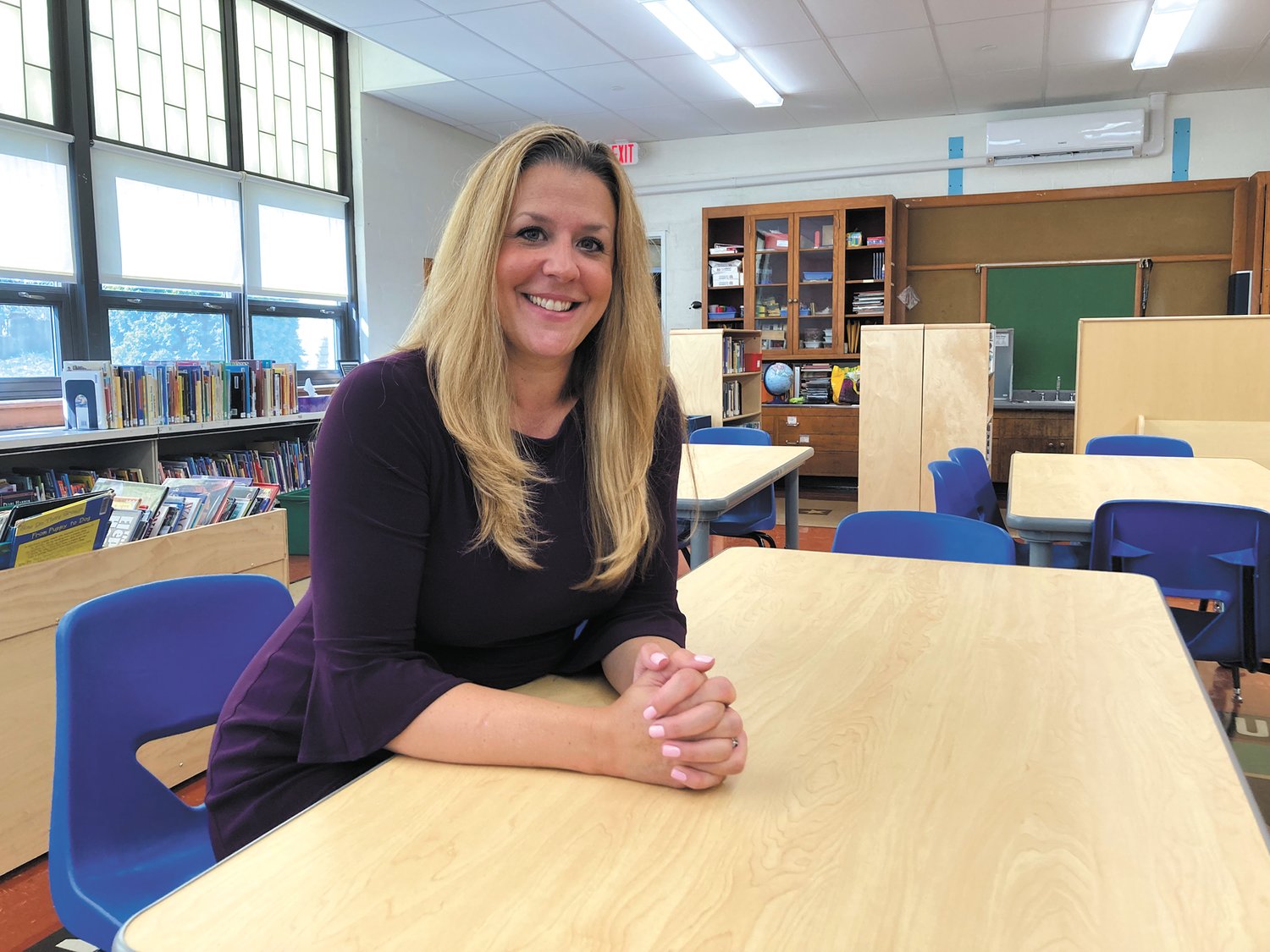 A MULTI-PURPOSE SPACE FOR LEARNING: Woodridge Elementary Principal Marisa Jackson came up with creating a 21st century multi-purpose, multimedia library space during the spring of 2020. Since then, she has worked with former librarian Ellen Basso and current librarian Deanna Brooks on making this a reality. (Herald photo)
