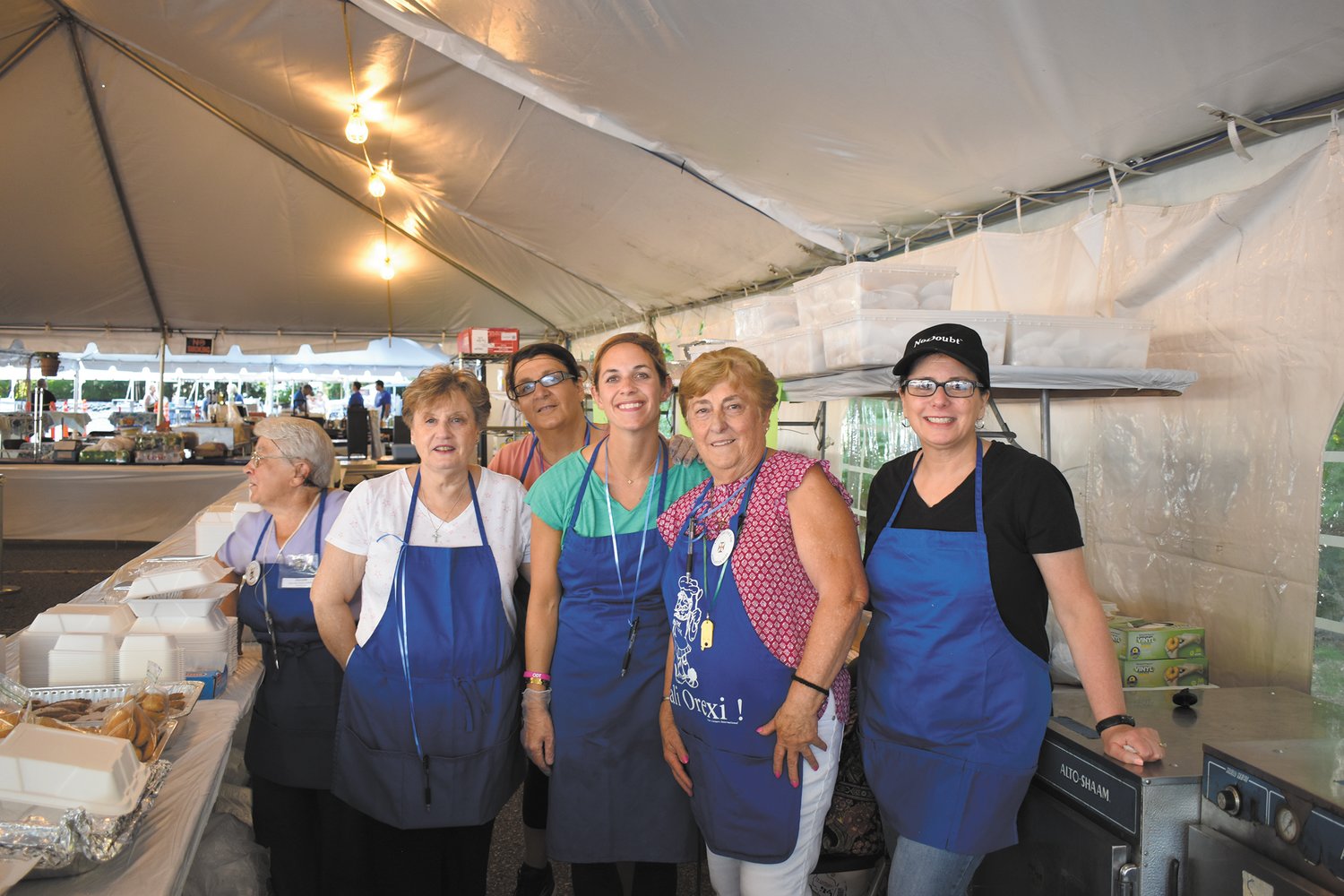 PASTRY PALS: Among the many ladies who volunteered to staff the Pastry Shoppe during last weekend’s Cranston Greek Festival are: Pauline Haralambides, Roula Pryous, Kathy Grammas, Tricia Rougas and Koula Rougas. (Photos courtesy of Nikki Poulos)
