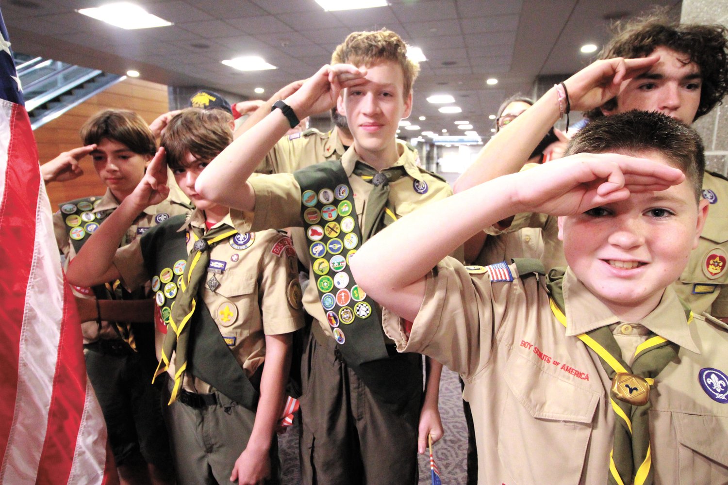 SALUTING THEIR SERVICE: Members of Boy Scout Troop 4 Gaspee were up as early as 4 a.m. Saturday in preparation of greeting members of Honor Flight Thunderbolt veterans as they arrived at Green Airport for their flight to Baltimore and day in the Nation’s Capital. (Warwick Beacon photos)