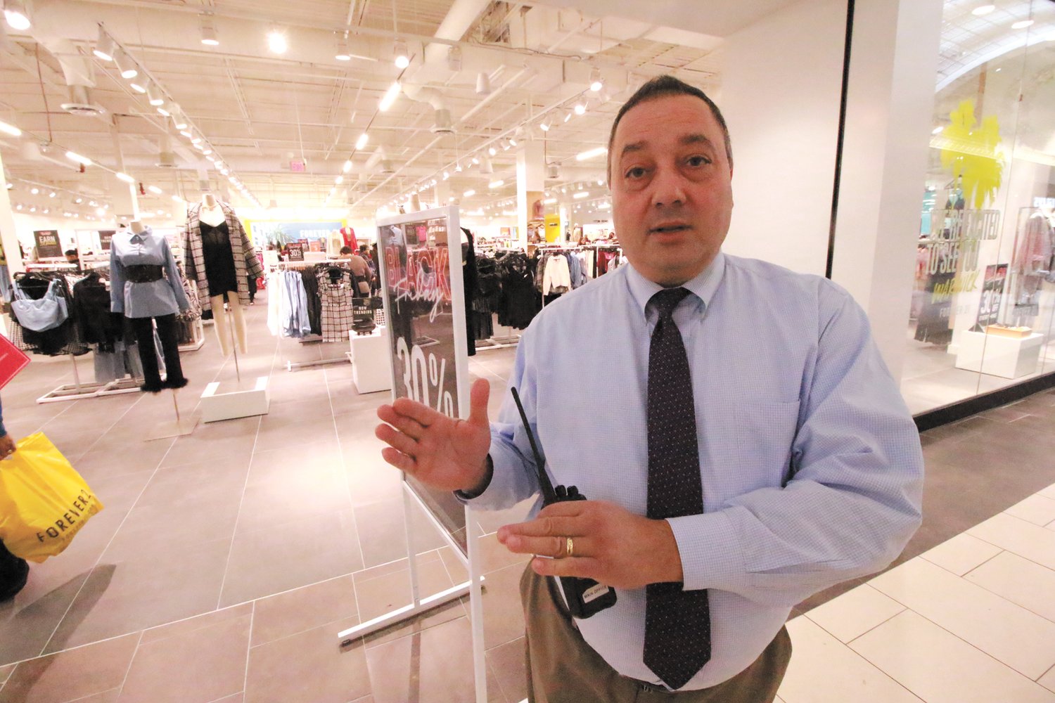 NEW TENANT…AND MORE TO COME: Domenic Schiavone outside the Forever 21 store that opened last spring at the Warwick Mall. The mall manager says a new to Rhode Island “theme based” outlet will be opening at the mall early next year.  (Warwick Beacon photos)