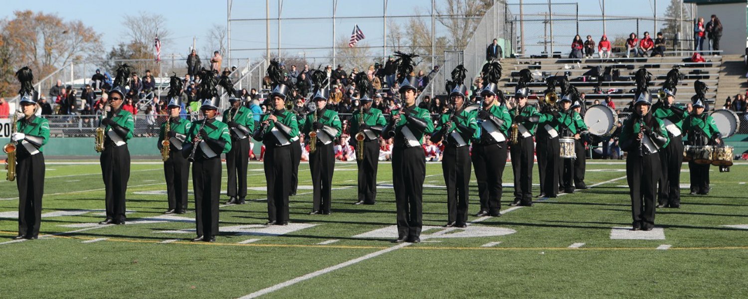 MARCHING ON: Members of the East marching band play for the crowd on Thanksgiving. (Photo by Mike Zawistoski)