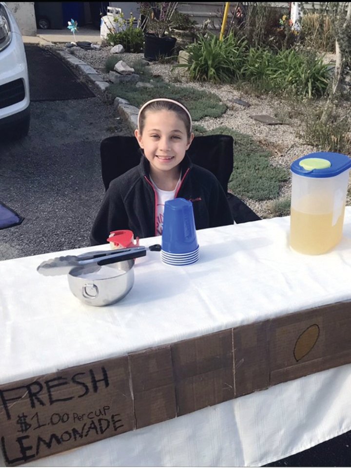 Kassidy Underwood at her lemonade stand last spring.