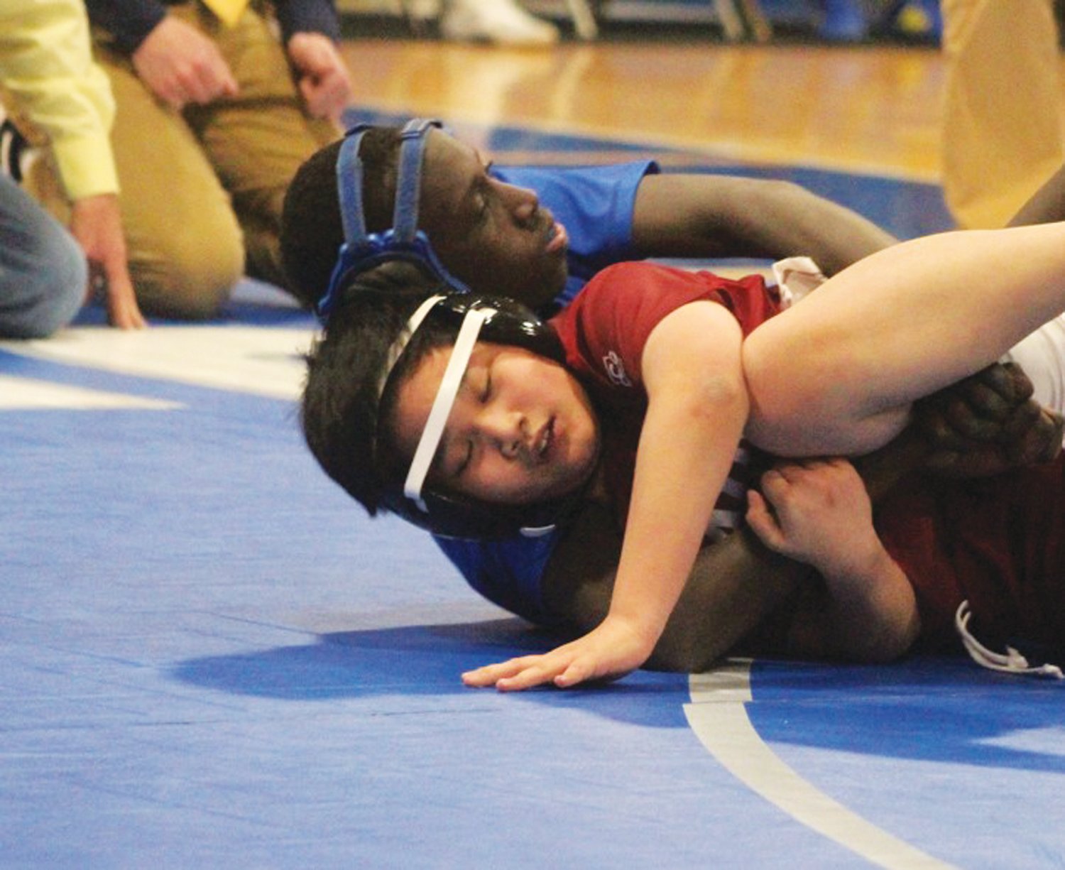 GRAPPLING MATCH: Bain wrestler Thon Ung looks to get back to his feet. Western Hills’