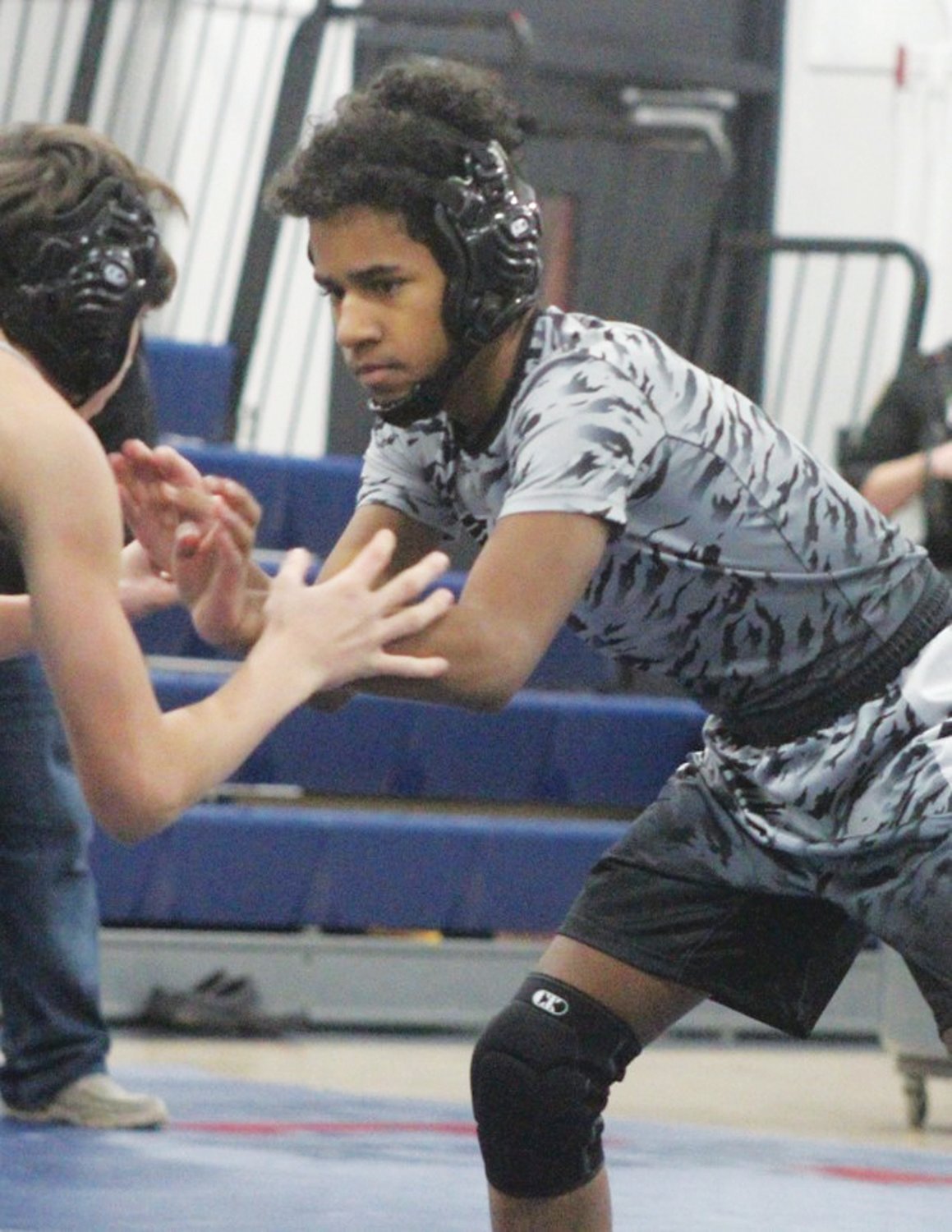 FINDING HIS RANGE: Kelvin Olea looks for a takedown. (Photos by Alex Sponseller)