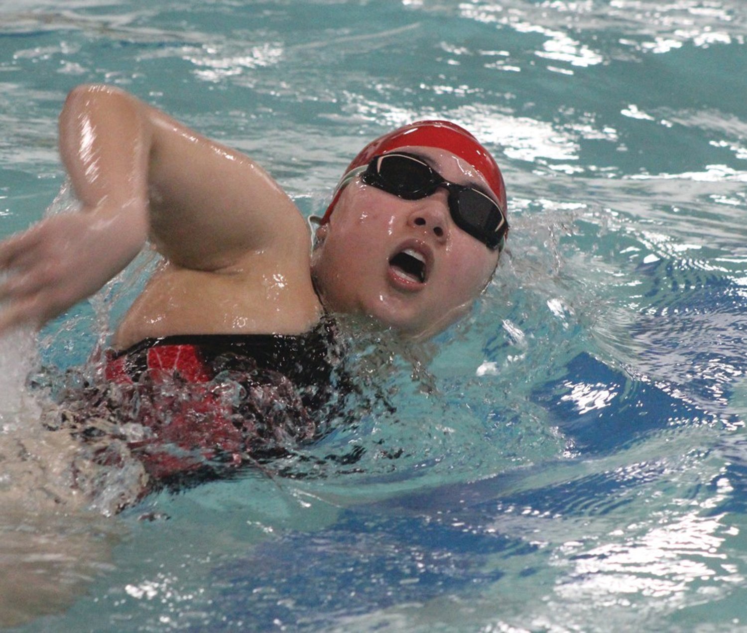 SWIMMING TO THE WIN: West’s Grace Kim last week against Toll Gate. (Photos by Alex Sponseller)