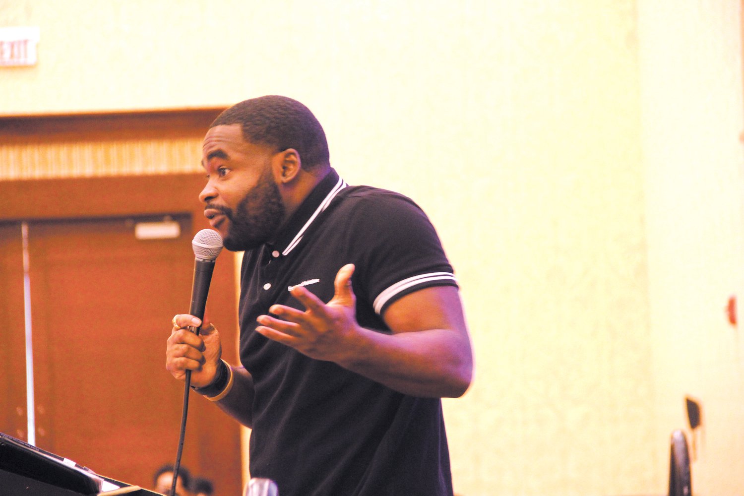 GET THE FLAVOR:  Luckson Omoh Omoaregba is an Upward Bound alumni delivered an inspirational message urging students not to be “fooled into putting appearance and aesthetics above flavor and substance.”
