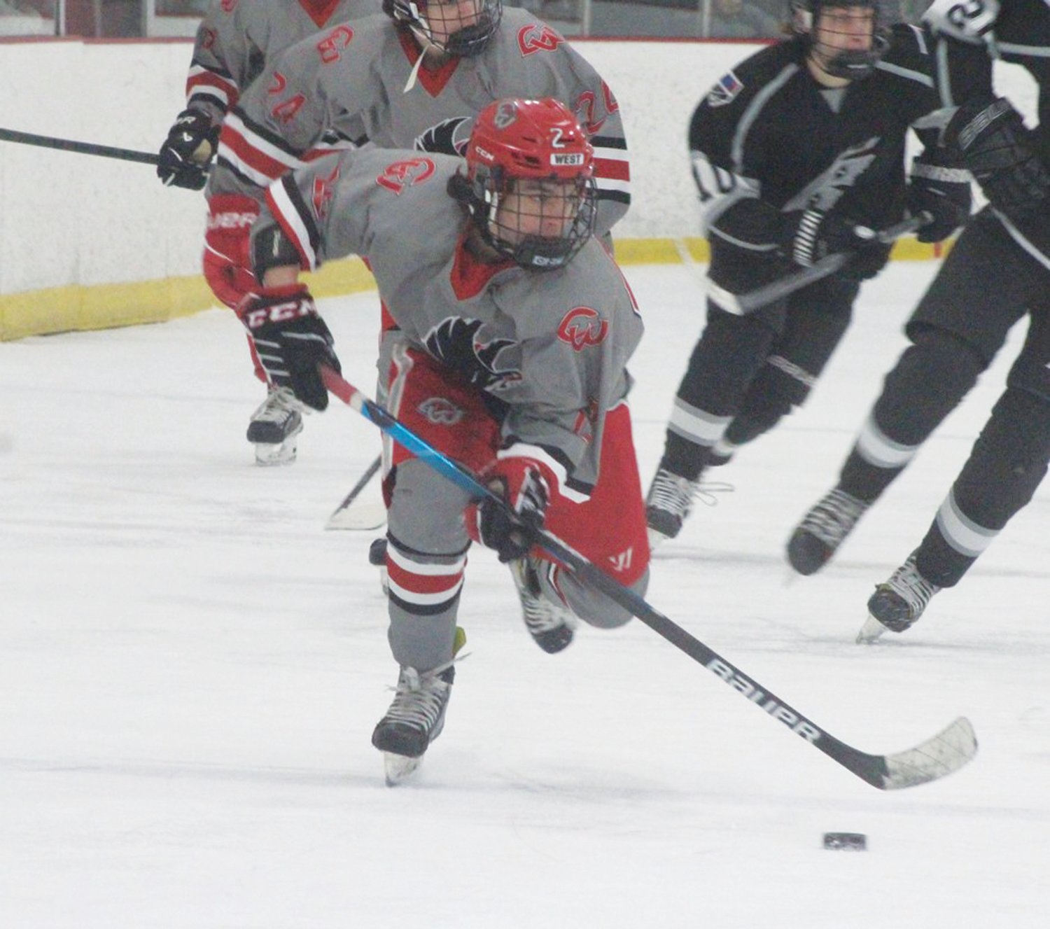 UP THE ICE: Jared Prior takes the puck up the ice last weekend. (Photos by Alex Sponseller)