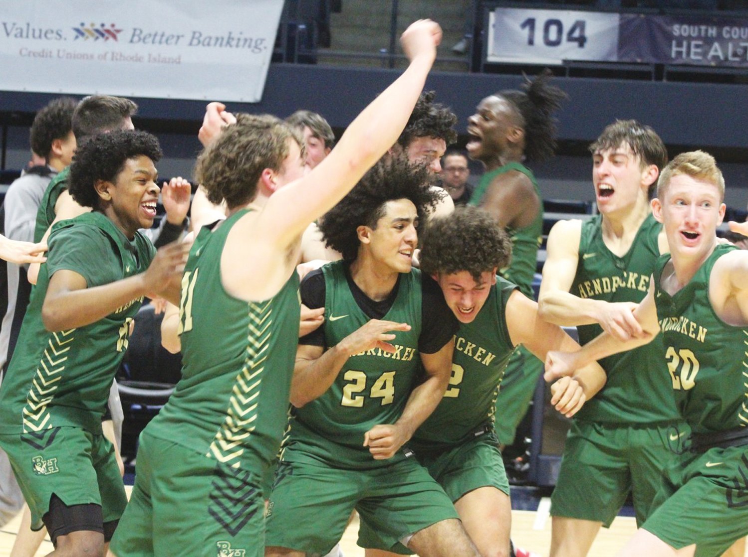 CHAMPS AGAIN: The Bishop Hendricken basketball team celebrates after winning the state title on Sunday. (Photos by Alex Sponseller)