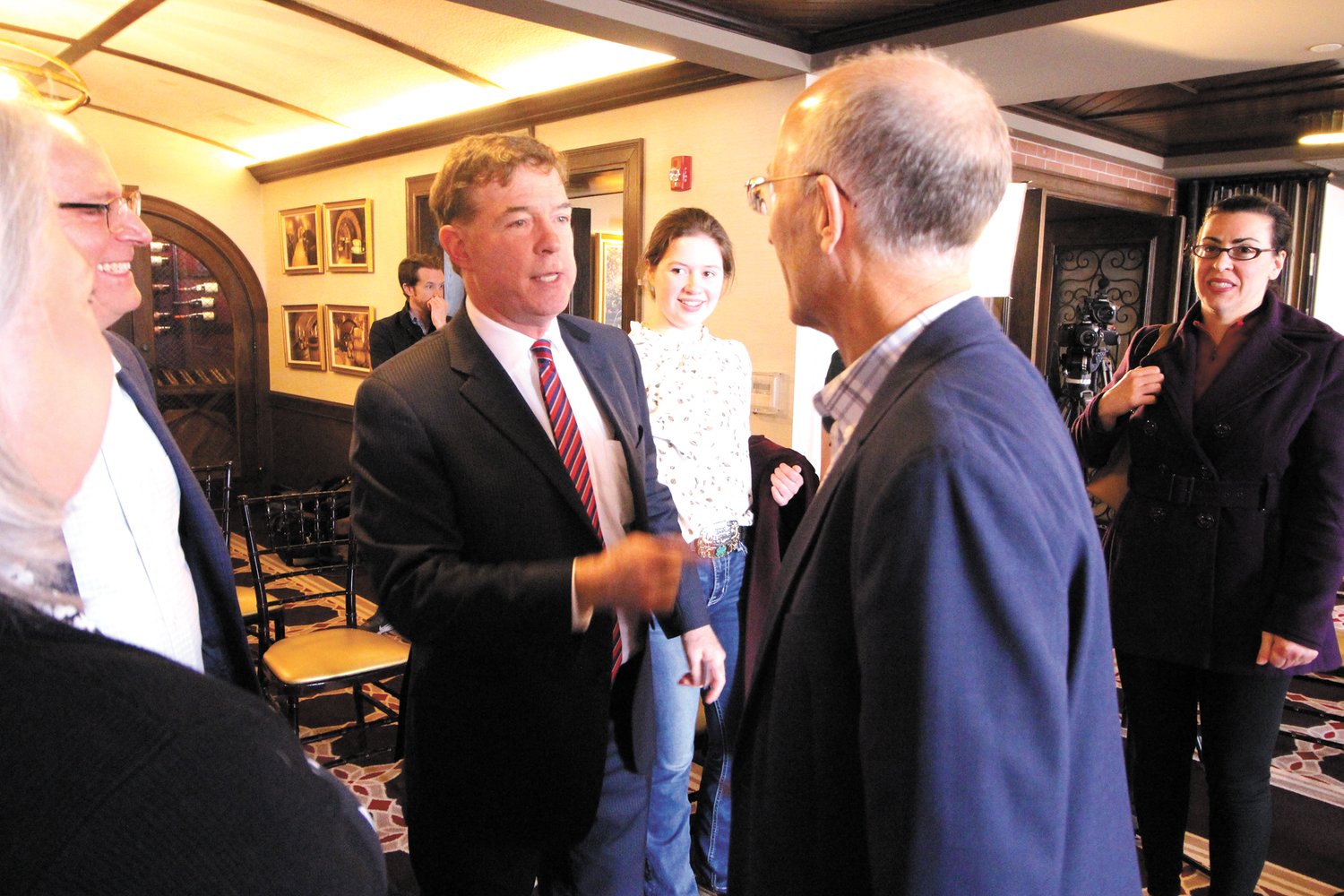 MINGLING: Following his comments at the Chapel View Grille, Steve Laffey lingered to renew acquaintances from the days he ran and served as mayor of Cranston. (Cranston  Herald photo)