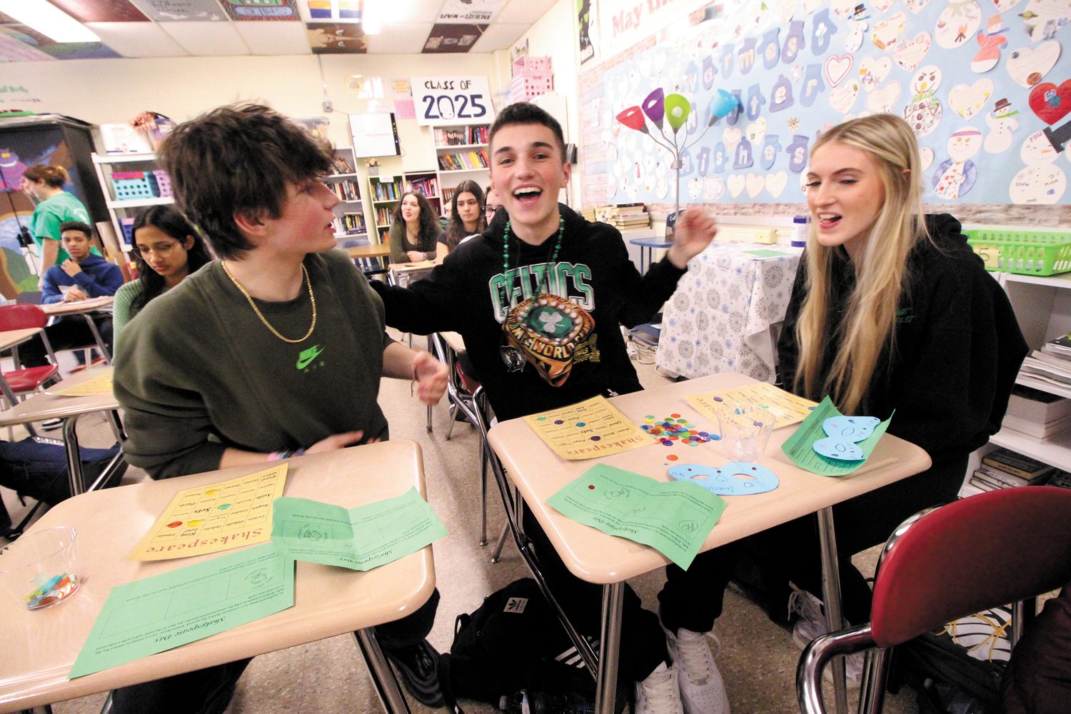 CAN YOU MATCH THEM? Students cheer as they play Shakespeare Bingo, a game they devised of matching characters with the plays they are in.
