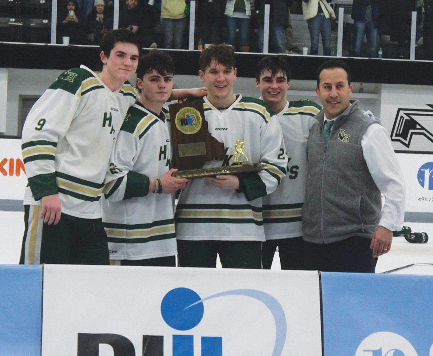 THREE STRAIGHT: The Bishop Hendricken hockey team after winning the state championship. (Photos by Alex Sponseller)