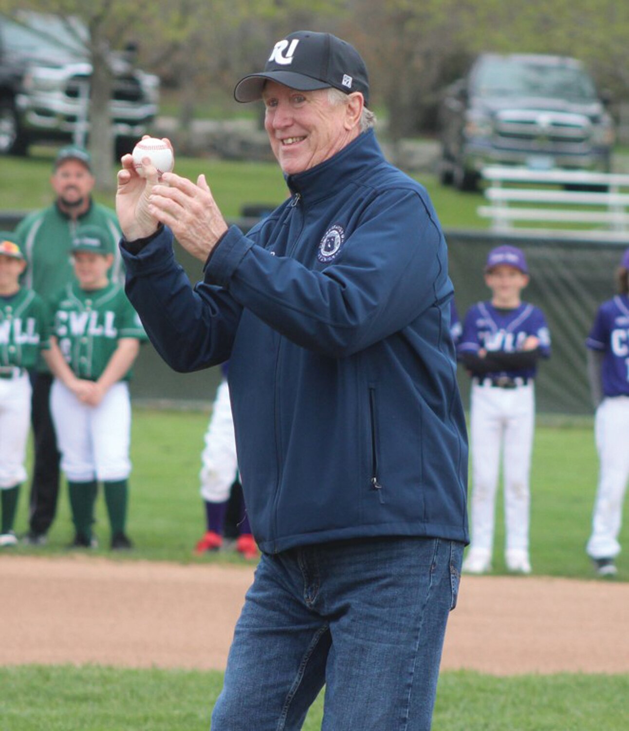 FIRST PITCH: Cranston Mayor Ken Hopkins throws out the ceremonial first pitch on Opening Day.