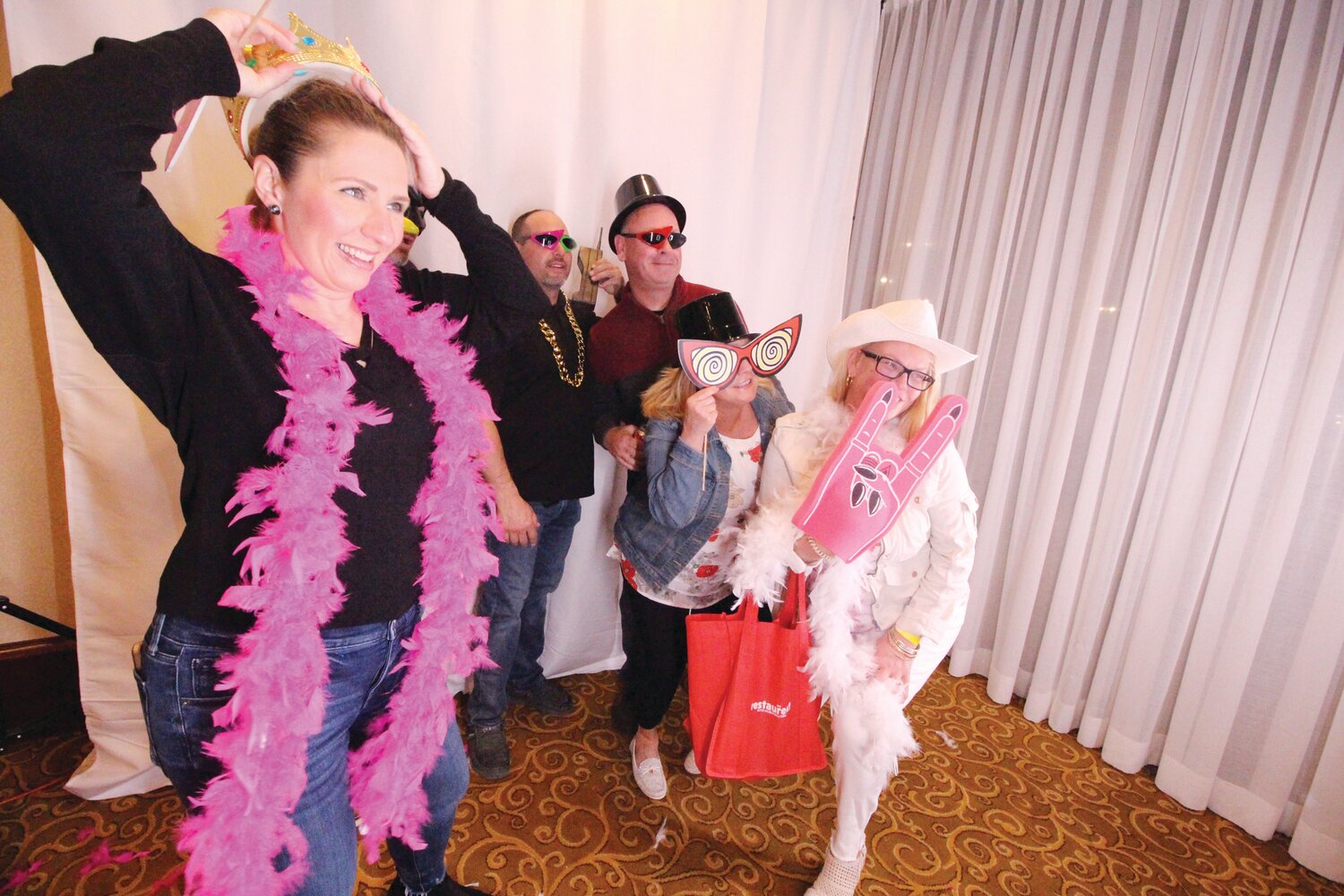 NOW THAT’S A PARTY: Forget the selfies, with a selection of attire visitors had the fun of assuming different roles as they posed at a Gala Photobooth. The company rents out booths for weddings, parties and events.