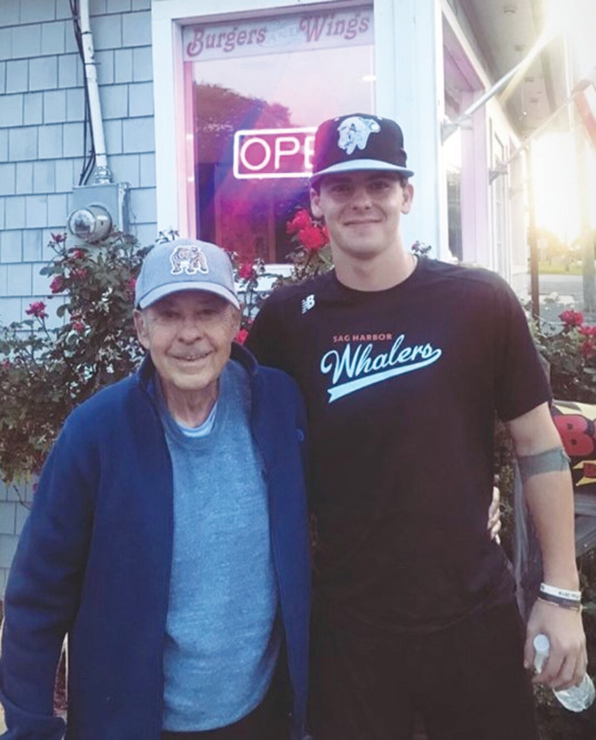PROUD GRANDFATHER: Warwick native Matt Woods along with his grandfather and local baseball legend Don Mezzanotte over the years. “My grandfather was my first baseball coach; my role model and my best friend – all in one person,”  said Woods of Mezzanotte, who passed away in 2020. Woods is currently playing for Maryland is hoping to hear his name called in the upcoming MLB Draft. (Submitted photos)